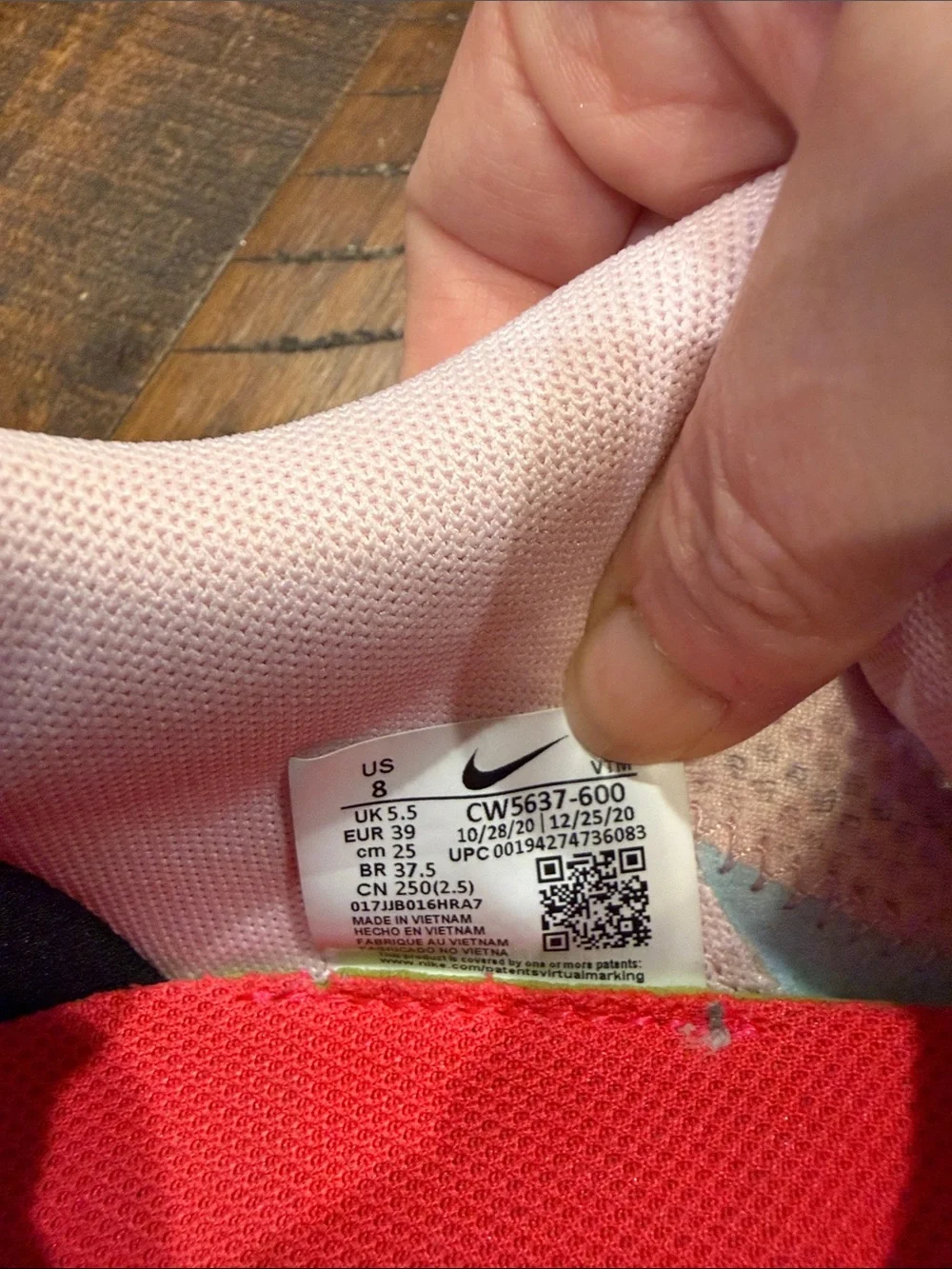 Nike Pink Mesh Running Sneakers with Black Swoosh and Neon Accents